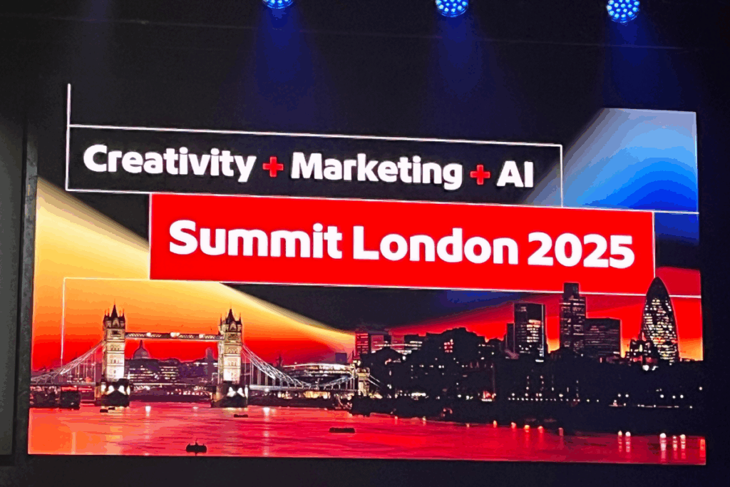 Image of the Adobe Summit title on stage 