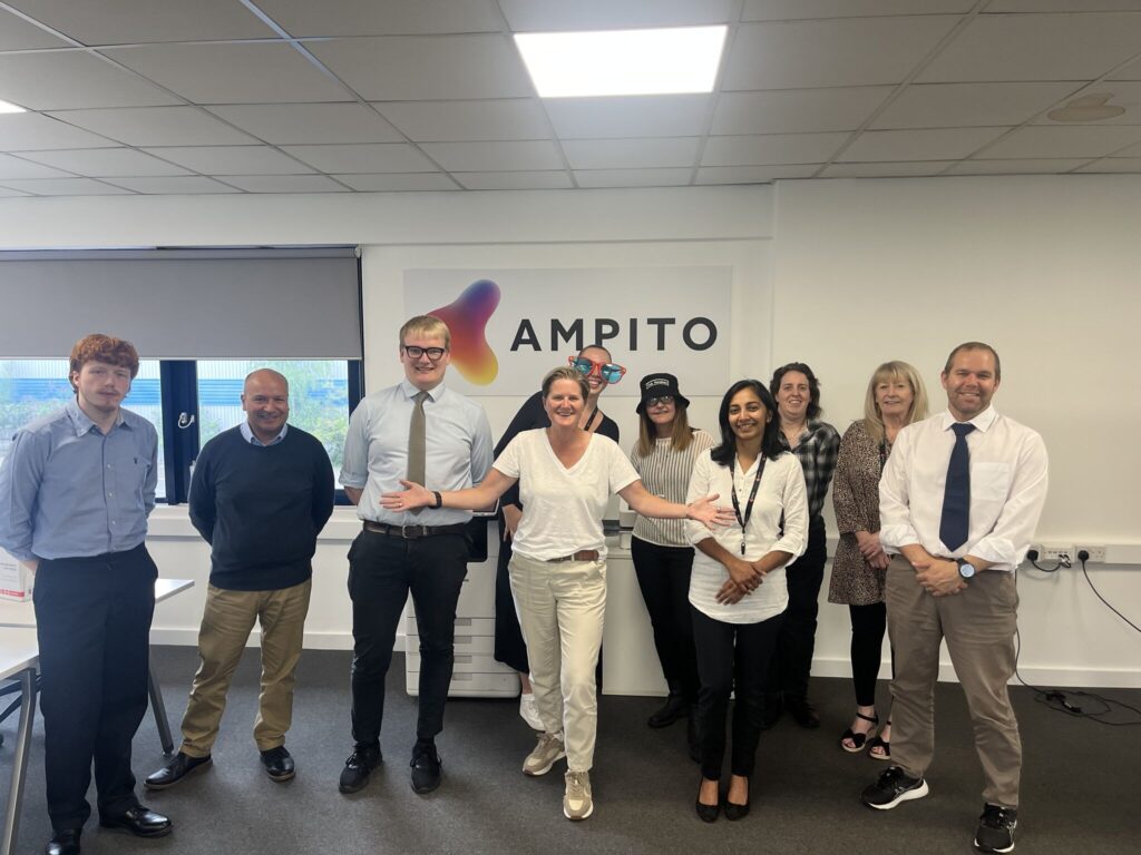 Image showing Rebecca Jones (CEO of objectsource) with some of the team at Ampito discussing our Adobe Commerce strategy.